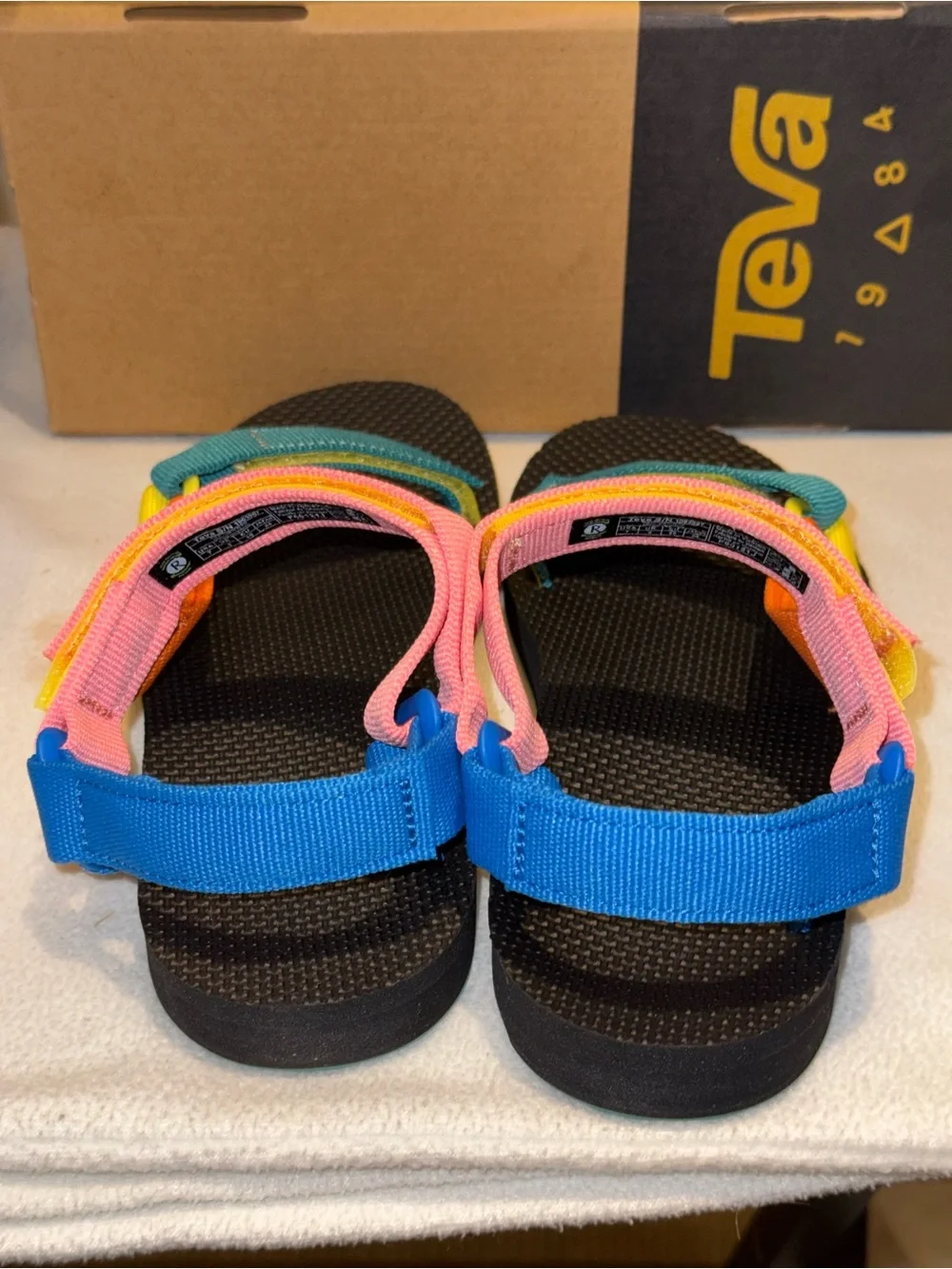 Teva Original Universal sandals in a 90s multi-color pattern